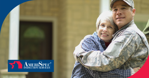 Military serviceman embracing an elderly woman