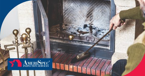 Person cleaning a fireplace with tools