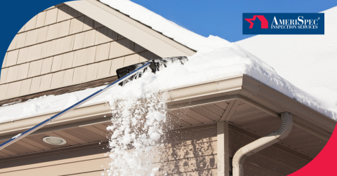 A snow-covered roof is being cleared with a snow rake, with snow cascading down towards the ground.